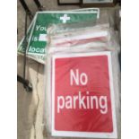 A QUANTITY OF SIGNS INCLUDING NO PARKING AND FIRST AID SIGNS ETC.