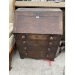 A GEORGE III OAK BUREAU WITH FALL FRONT AND FIVE DRAWERS - 27" WIDE