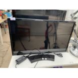 AN LG 30 INCH TELEVISION TO INCLUDE A STAND BELIEVED TO BE IN WORKING ORDER BUT NO WARRANTY