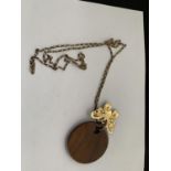 A WOODEN BUTTERFLY NECKLACE