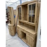 A MODERN PINE EFFECT DRESSER AND A PINE EFFECT CORNER CABINET