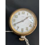 A BRASS SWISS EIGHT DAY DASHBOARD CLOCK/WATCH (A/F)