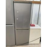 A SILVER SAMSUNG 'COOL N COOL' UPRIGHT FRIDGE FREEZER BELIEVED TO BE IN WORKING ORDER - NO WARRANTY