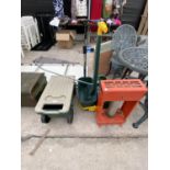 A GARDEN KNEELER, TWO FERTILISER SPREADER AND A GREENHOUSE HEATER