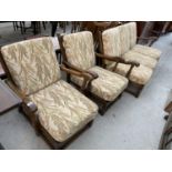 AN ERCOL COLONIAL ELM THREE PIECE SUITE