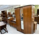 AN ADVANCE RETRO THREE PIECE TEAK BEDROOM SUITE - A DRESSING TABLE, WARDROBE AND CHEST OF DRAWERS