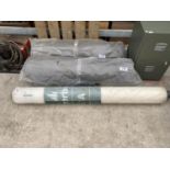 A ROLL OF CLEAR POLYTHANE AND TWO ROLLS OF UNDERLAY