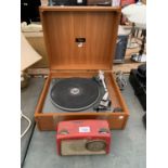 A RADON RECORD PLAYER AS SELECTED BY THE DESIGN CENTRE LONDON AND A RED VINTAGE DANSETTE RADIO