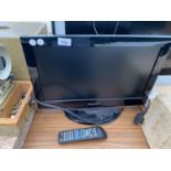 A SAMSUNG 22 INCH HD TELEVISION TO INCLUDE REMOTE CONTROL BELIEVED TO BE IN WORKING ORDER BUT NO