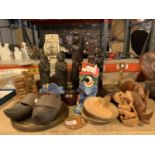 A GROUP OF WOODEN ITEMS TO INCLUDE AFRICAN FIGURES, RHINO, CLOGS AND OTHER FIGURES