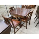 AN EARLY 20TH CENTURY OAK DRAW-LEAF DINING TABLE AND FOUR CHAIRS