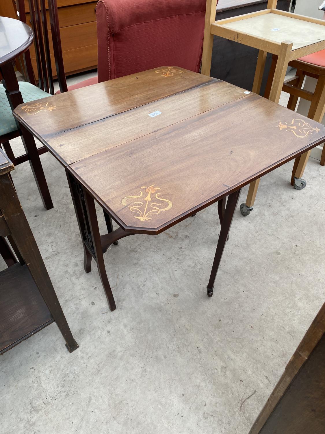 A 19TH CENTURY MAHOGANY AND INLAID SUTHERLAND TABLE WITH CANTED CORNERS