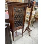 AN EDWARDIAN MAHOGANY CORNER CUPBOARD WITH GLAZED AND LEADED DOOR ON OPEN BASE 25" WIDE