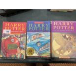 A TRIO OF BOOKS FROM THE HARRY POTTER SERIES: 'THE PRISONER OF AZKABAN', 'THE CHAMBER OF SECRETS'