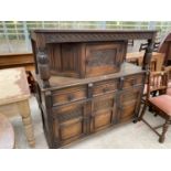 AN OAK JACOBEAN STYLE COURT CUPBOARD, 54" WIDE