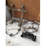 THREE VINTAGE RUSTIC STYLE CEILING LIGHTS (TWO WAGON WHEEL STYLE) AND A CAST FIRE GRATE FRONT