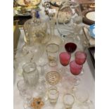 A QUANTITY OF ASSORTED GLASSSWARE TO INCLUDE DECANTERS ETC