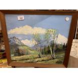 A FRAMED AND SIGNED OIL ON CANVAS OF A SNOWY MOUNTAIN SCENE