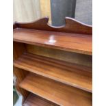 A REPRODUCTION MAHOGANY WATERFALL BOOKCASE WITH TWO DRAWERS TO BASE, 28.5" WIDE