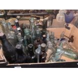 A LARGE COLLECTION OF VINTAGE BOTTLES