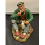 A ROYAL DOULTON FIGURINE WAYFARER