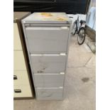 A FOUR DRAWER METAL FILING CABINET