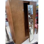 A RETRO TEAK WARDROBE WITH TWO DOORS