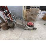 A HONDA HR216 PETROL ROTARY MOWER