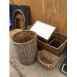 FIVE VARIOUS WICKER BASKETS INCLUDING TWO METAL HANDLED EXAMPLES AND AN EASEL