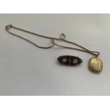 A ROLLED GOLD LOCKET AND A MICRO MOSAIC BAR BROOCH