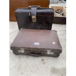 A SMALL VINTAGE SUITCASE AND A VINTAGE BRIEF CASE