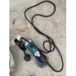 A MAKITA ANGLE GRINDER - IN W/O