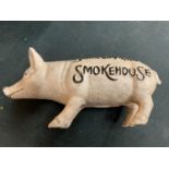 A SOUTHERN PRIDE SMOKEHOUSE CAST METAL MONEY PIG