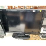 A SHARP AQUOS 35 INCH LCD TELEVISION TO INCLUDE STAND AND REMOTE CONTROL