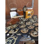 A SELECTION OF HORSE BRASSES, TANKARDS, BISCUIT BARRELS AND A FURTHER CANNON ORNAMENT