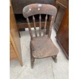 A VICTORIAN ELM/BEECH CHILDS ROCKER