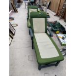 TWO RECLINING GARDEN SUN LOUNGERS WITH PADS AND A HEATED ELECTRIC BLANKET