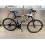 A CARRERA CROSSFIRE 24 SPEED SHIMANO GEAR MOUNTAIN BIKE WITH FRONT SUSPENSION
