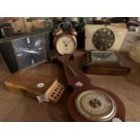 A GROUP OF FOUR RETRO CLOCKS, A BAROMETER AND A WOODEN PEG BOX