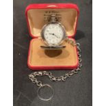 A WHITE METAL POCKET WATCH WITH CHAIN