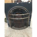A VINTAGE CAST FIRE PLACE WITH GRATE AND FIRE GUARD