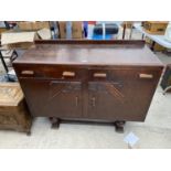 A MID 20TH CENTURY OAK SIDEBOARD, 47" WIDE