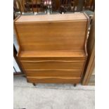 A VINTAGE TEAK FALL FRONT BUREAU WITH THREE DRAWERS, 32" WIDE
