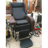AN ELECTRIC RECLINING MEDICAL CHAIR