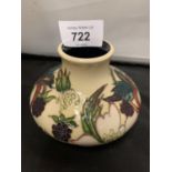 A LIMITED EDITION MOORCROFT BRAMBLE DELL 3 INCH VASE