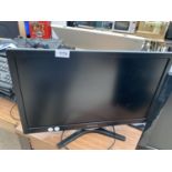 A 23 INCH POLAROID LCD TELEVISION BELIEVED TO BE IN WORKING ORDER BUT NO WARRANTY