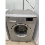 A SILVER BEKO 7KG WASHING MACHJINE WM74155 LS. BELIEVED TO BE IN WORKING ORDER - NO WARRANTY