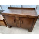 A MID 20TH CENTURY OAK SIDEBOARD, 48" WIDE