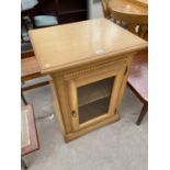 A MODERN OAK CABINET WITH SINGLE GLASS DOOR, 25" WIDE