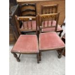 THREE OAK SPINDLE BACK DINING CHAIRS AND A LADDERBACK CHAIR